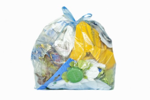 Company team in Wanstead reviewing compliance documents