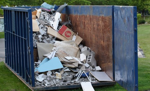 Professionals conducting loft clearance in a Wanstead home